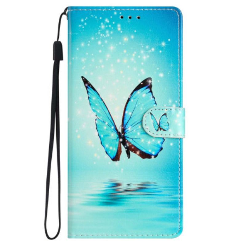 Capa De Couro Para iPhone 15 De Cordão Borboleta Azul Em Vôo Com Alça